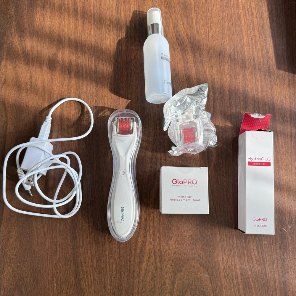 GloPRO micro stimulation facial tool with 2 extra heads and serum